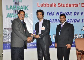 Dr. Ehsan Malik Chairman IBA Punjab University presented Shield to Dr. Raza Mustafa Top Best Donor (2013)
