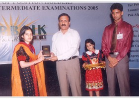 Manzoor-ul-Hassasn Niazi Controller of Exams BISE-Lahore presented Gold Medal & Shield to Khadeeja Arshad. (2005)