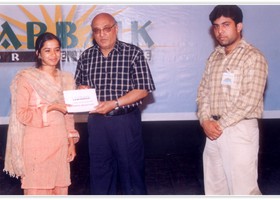 
Amjad Islam Amjad presented Cash Scholarship to Amna Moazzam. (2006)