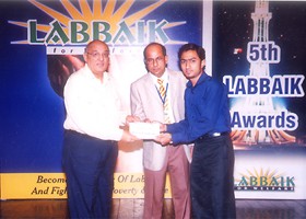 
Amjad Islam Amjad presented Cash Scholorship to Hafiz Faraz Mansoor  Ali. (2007)