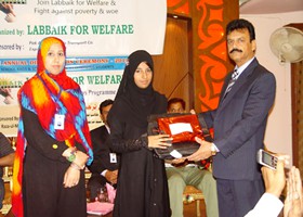 
Nisar Zia Chairman LFW presented School Bag & Uniform to student (2013)