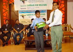 
Muhammad Irshad VP LFW presented School Bag & Uniform to student (2013)